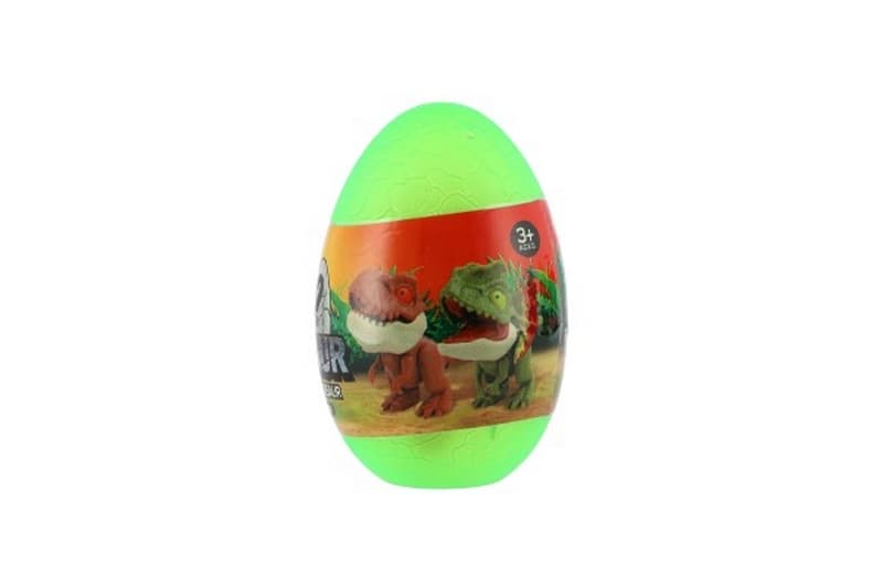 Dinosaure mordant dans un œuf en plastique