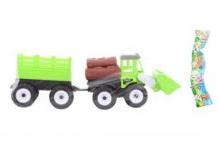 Traktor rakodóval és vontatójárművel