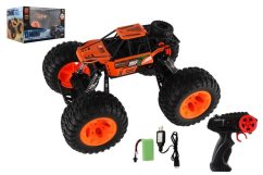 Autó RC Off-Road terepjáró 2.4GHz műanyag 32cm újratölthető csomag+akkumulátorok narancssárga dobozban 38x23x26cm