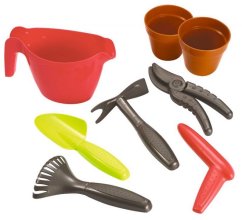 Chariot de jardin avec outils, pots et arrosoir