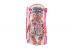 Bébé/poupée en plastique solide 25 cm fonctionnant sur piles avec son dans un sac en plastique