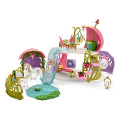 Schleich Sparkly kwiatowy dom z jednorożcami, jeziorem i stajnią