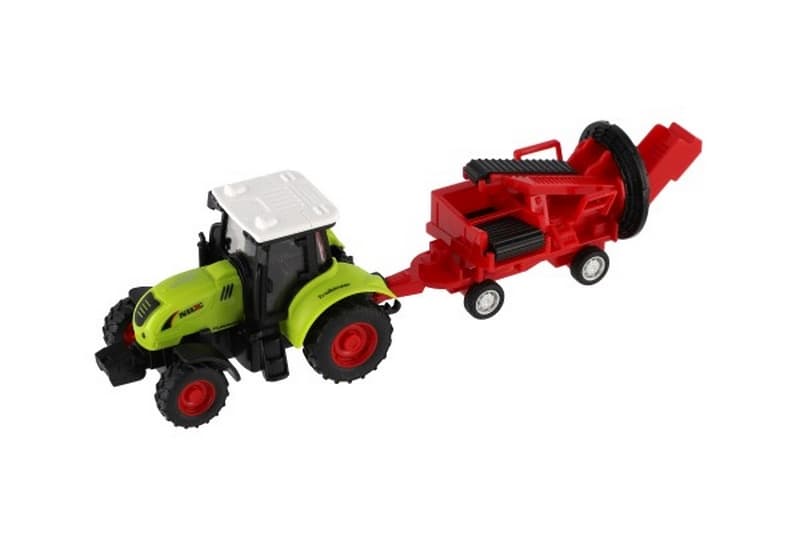 Traktor s vlekem plast na setrvačník
