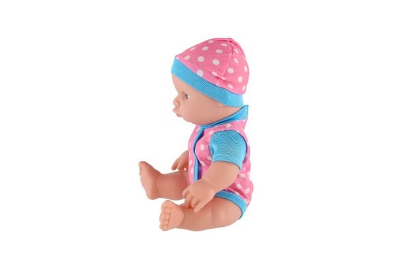 Bébé/poupée en plastique solide 25 cm fonctionnant sur piles avec son dans un sac en plastique