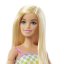Barbie modelka na invalidním vozíku v kostkovaném overalu