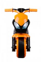 Moto scooter orange et noir en plastique dans un sac 24m+.